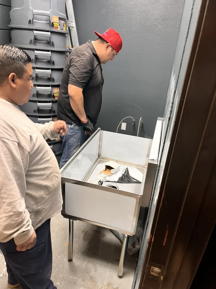 Commercial plumbing and sink installation in West Side